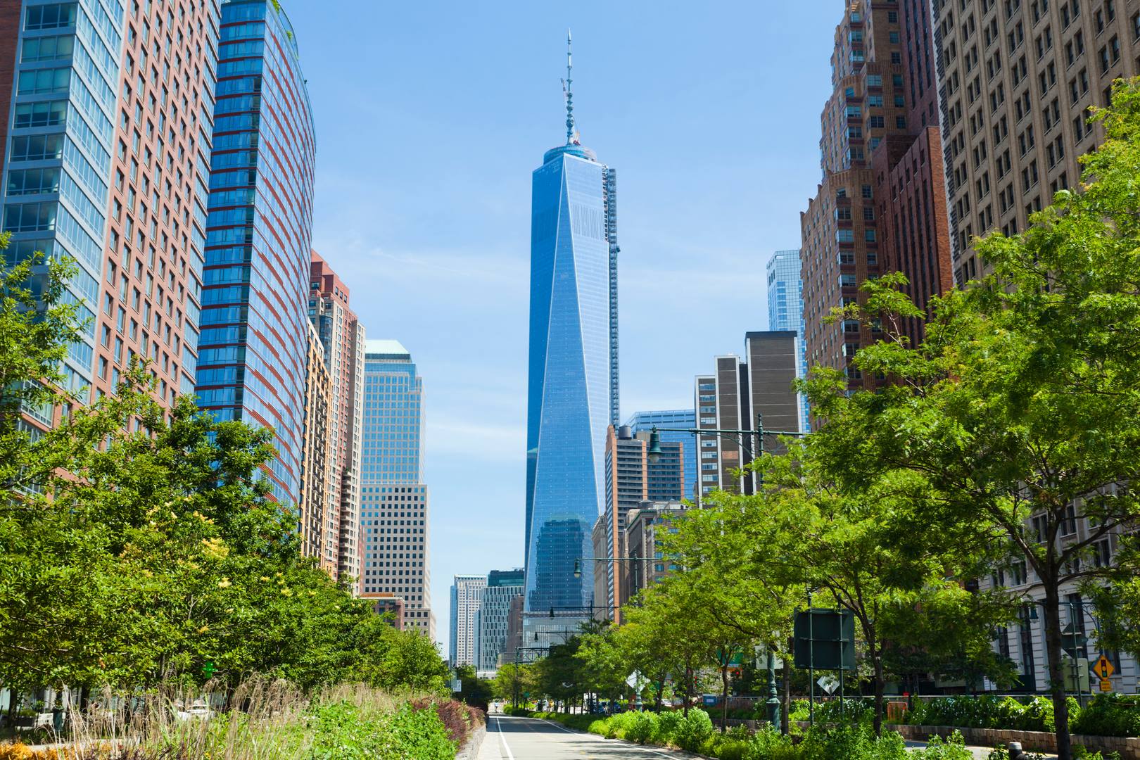 Tree-lined street leading toward One World Trade Center in Lower Manhattan near 19 Dutch